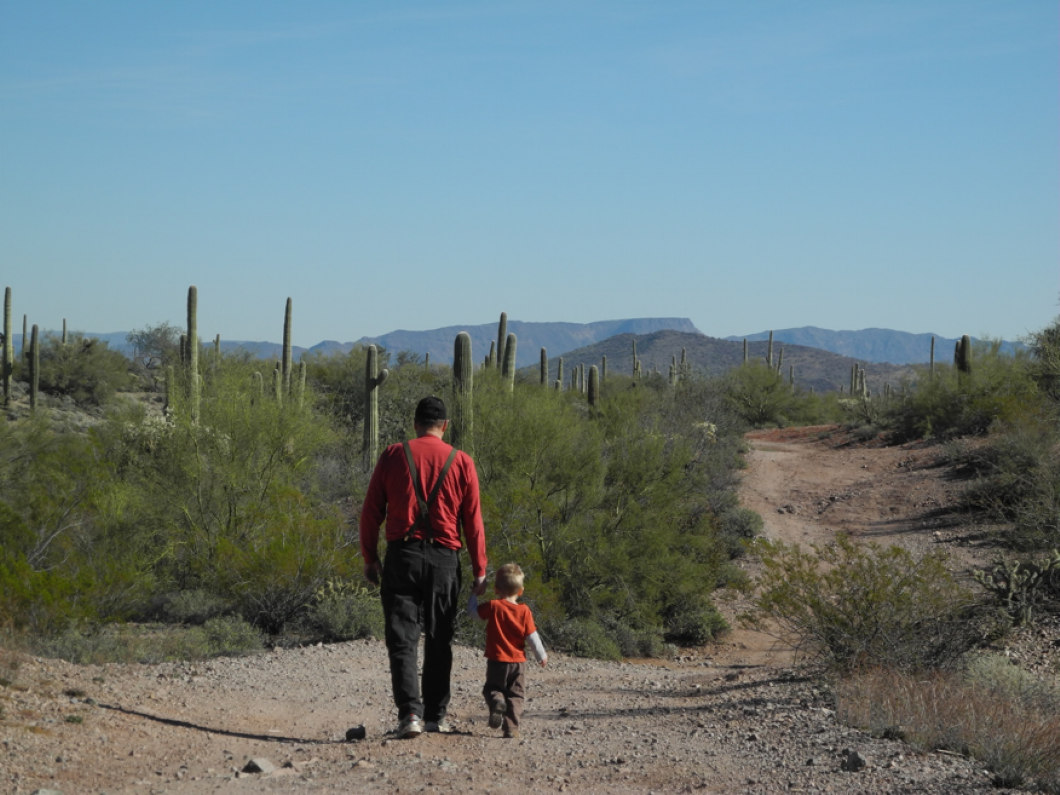 Pat Schilling 'Walking with Granddad' one little guy, one old one, walking down a  road hand in hand